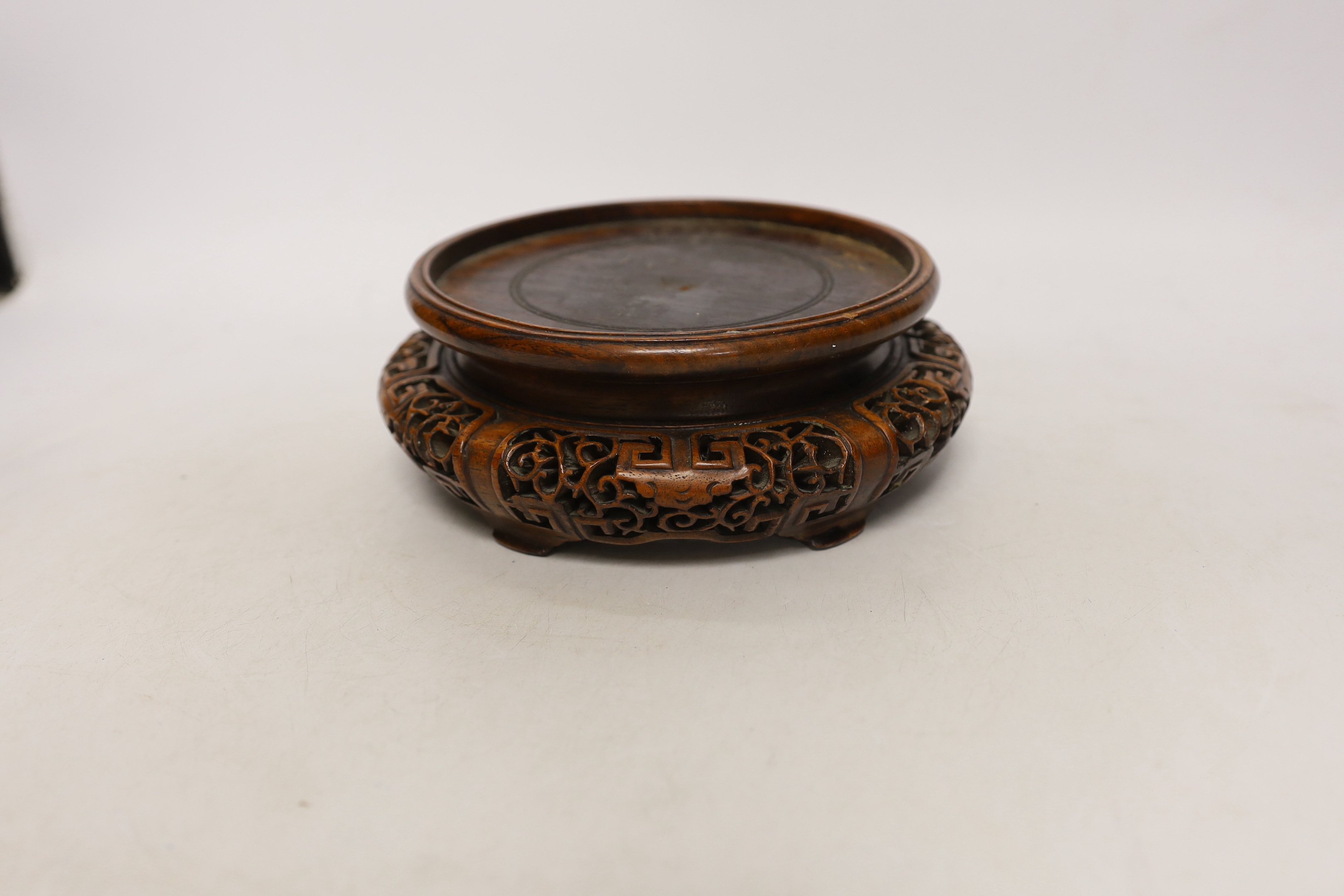 A Chinese hongmu stand, early 20th century, 19cm in diameter